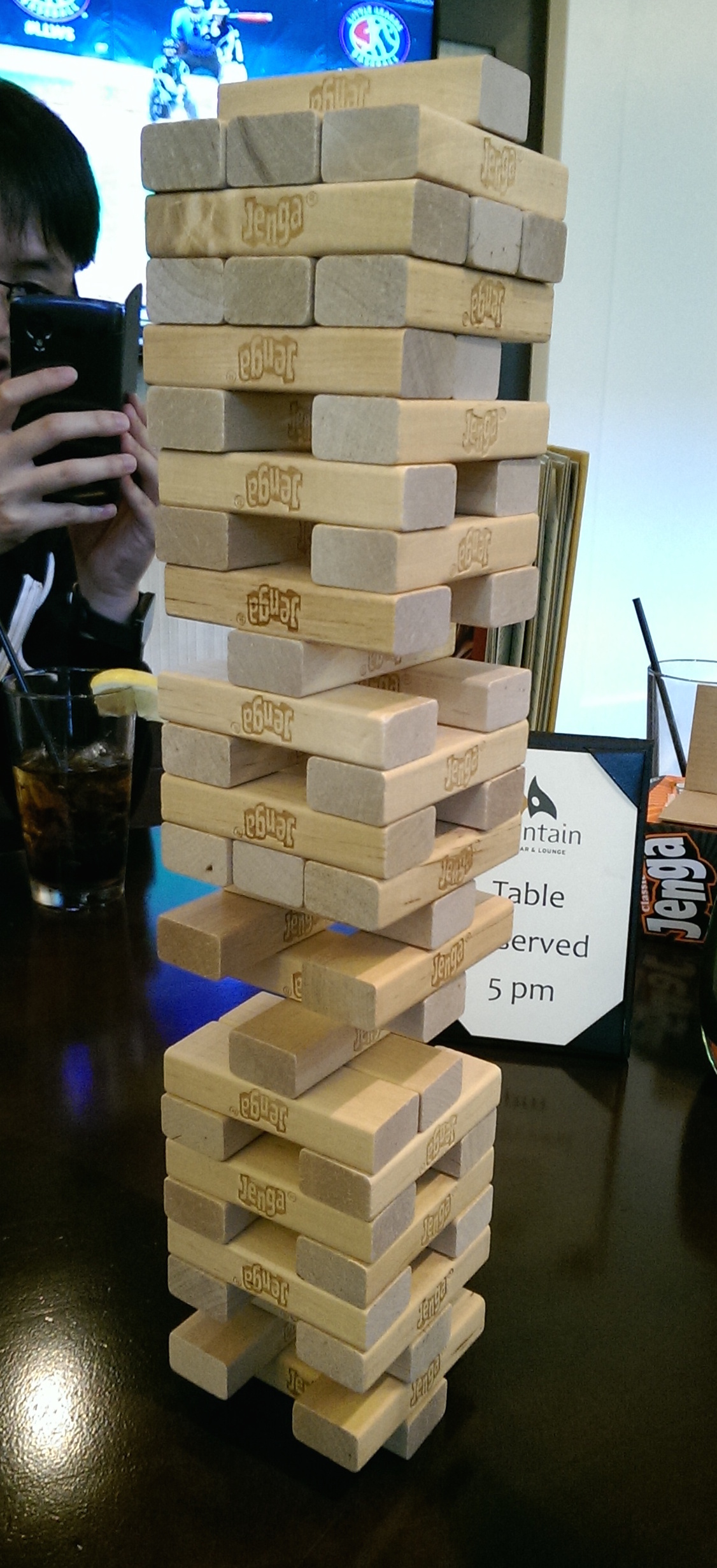 [Tall Jenga tower]